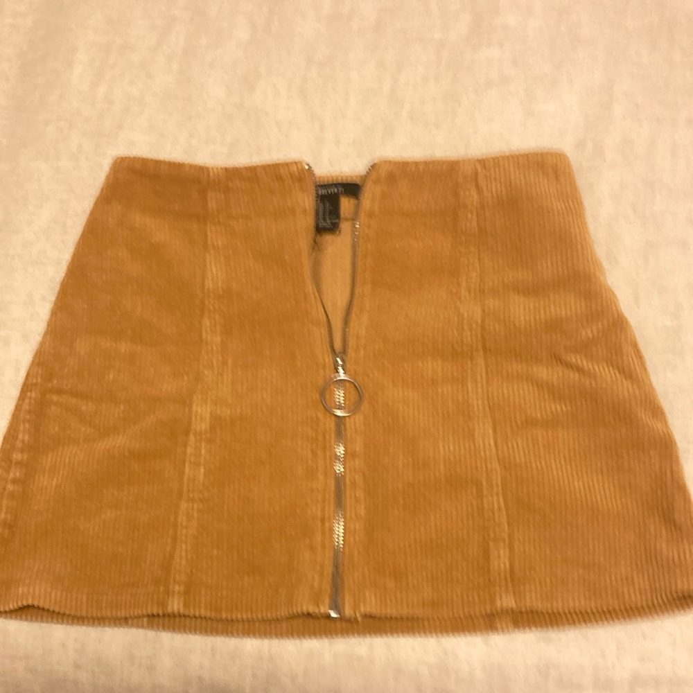 Wide wale corduroy mini skirt mustard color with zipper all the way down.